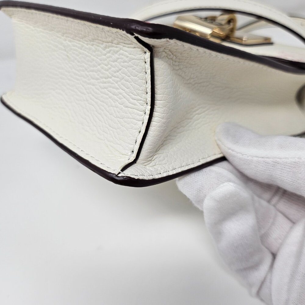 DKNY Elisa North-South Butterfly print leather crossbody mini bag - Picture 7 of 13